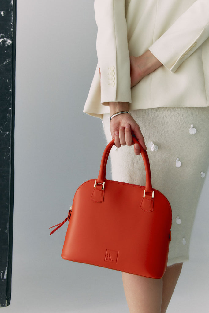 Bolso naranja. La tendencia Tangerine, uno de los colores más vivos para despertar tu look