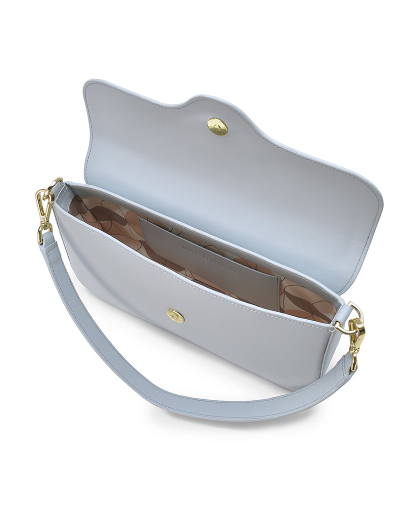 Bolso baguette de piel color azul celeste Leandra imagen interior