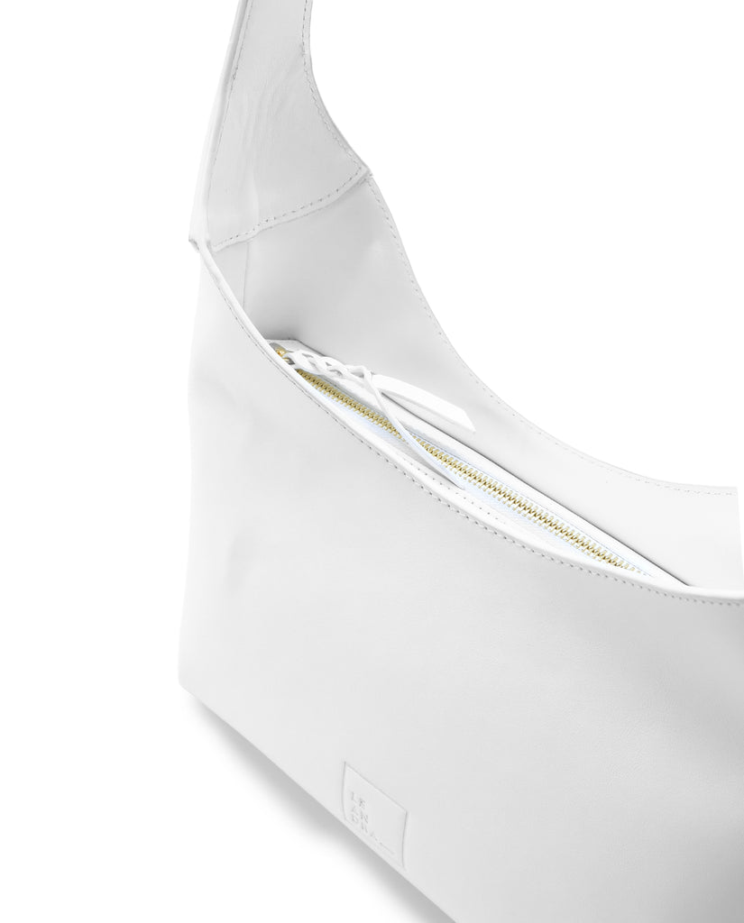 Imagen detalle cremallera de bolso hobo de piel color blanco Leandra.