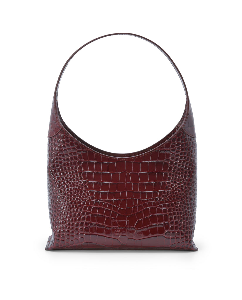 Imagen frontal de bolso hobo de piel grabada en coco color burdeos Leandra.