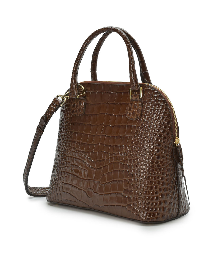 Imagen lateral de bolso de mano de piel grabada en coco color marrón Leandra. Made in Spain