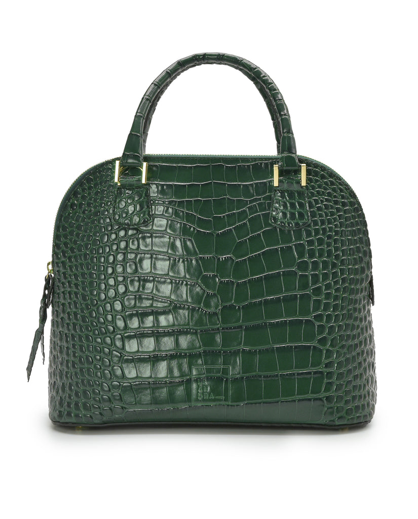 Imagen frontal con asa de mano de bolso de piel grabada en coco color verde Leandra. Fabricado en Ubrique, España