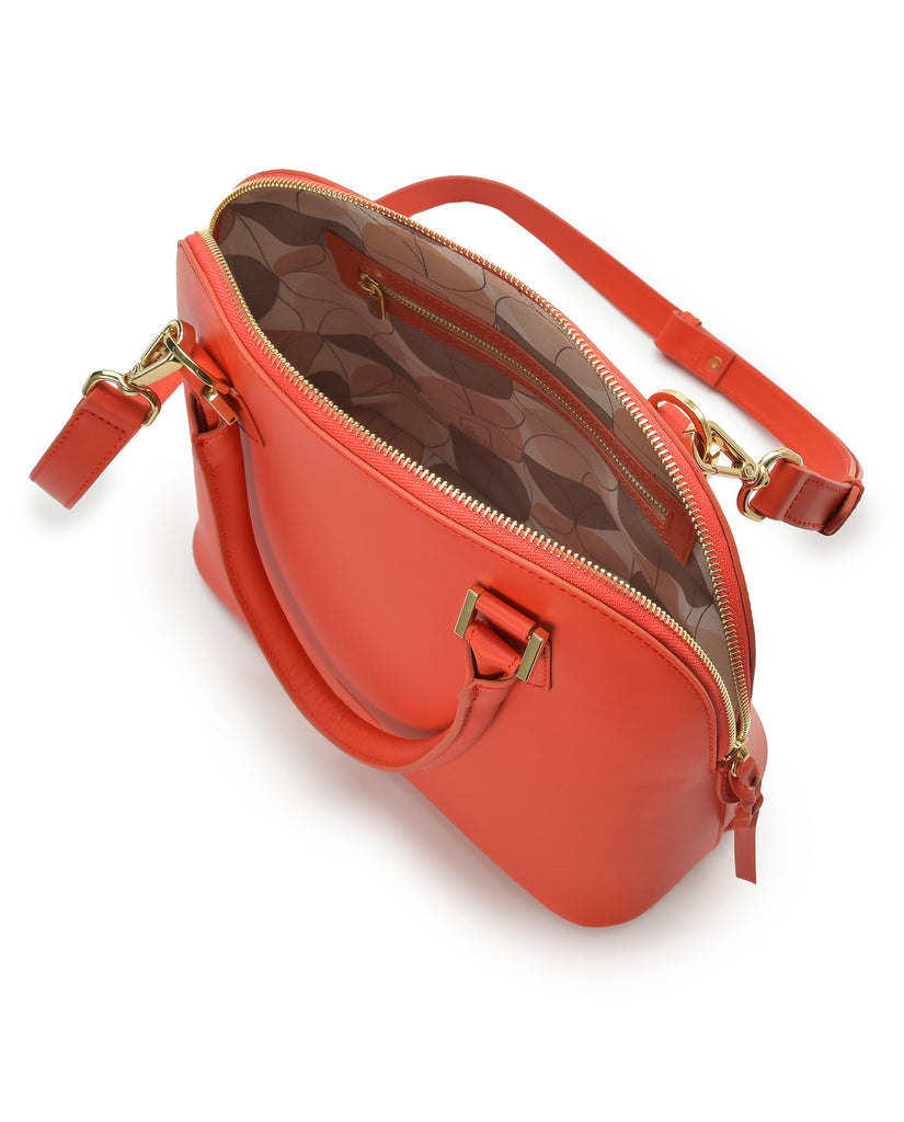 Interior detalle cremallera de bolso de mano de piel color naranja Leandra a la venta en leandrabrand.com. Made in Spain