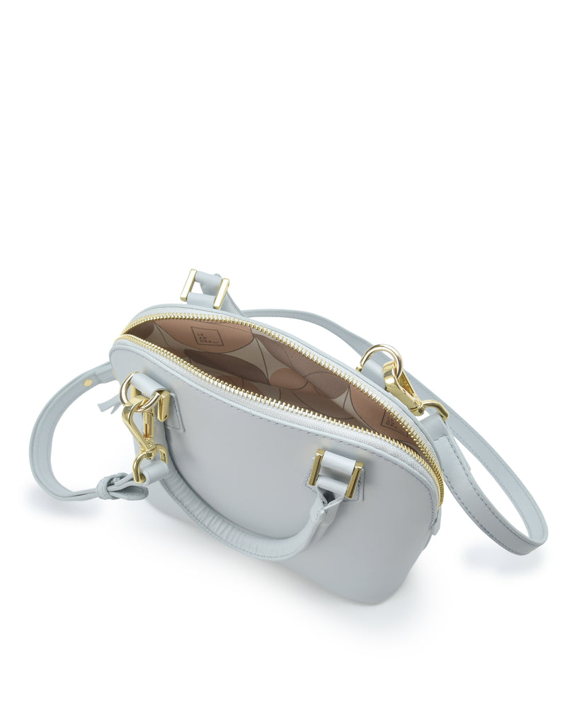 Interior asa corta de bolso de mano mini de piel color azul cielo Leandra. Made in Spain