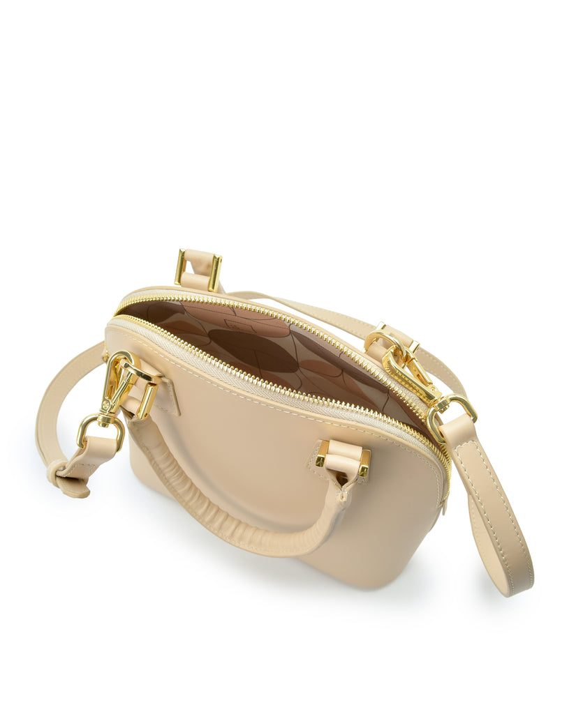 Interior asa corta de bolso de mano mini de piel color beige Leandra. Bolsos made in Spain
