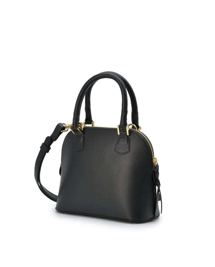 Imagen lateral de bolso de mano mini de piel color negro Leandra. Bolso made in Spain