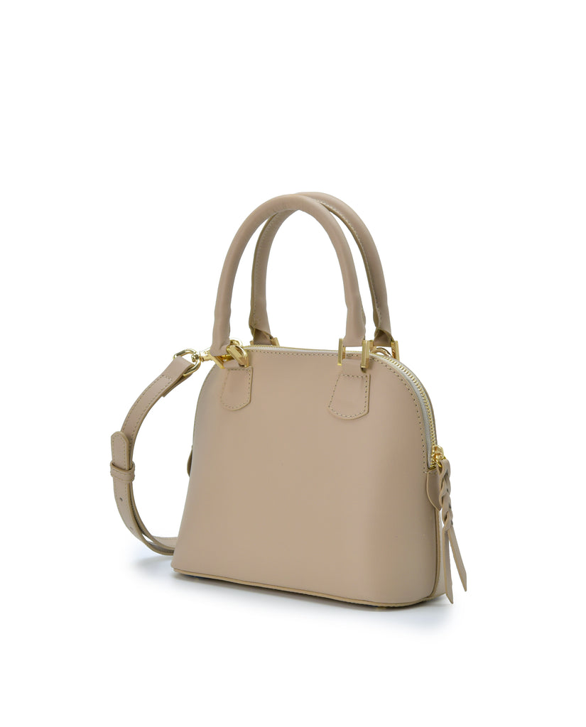 Imagen lateral de bolso de mano mini de piel color taupe Leandra. Bolso made in Spain