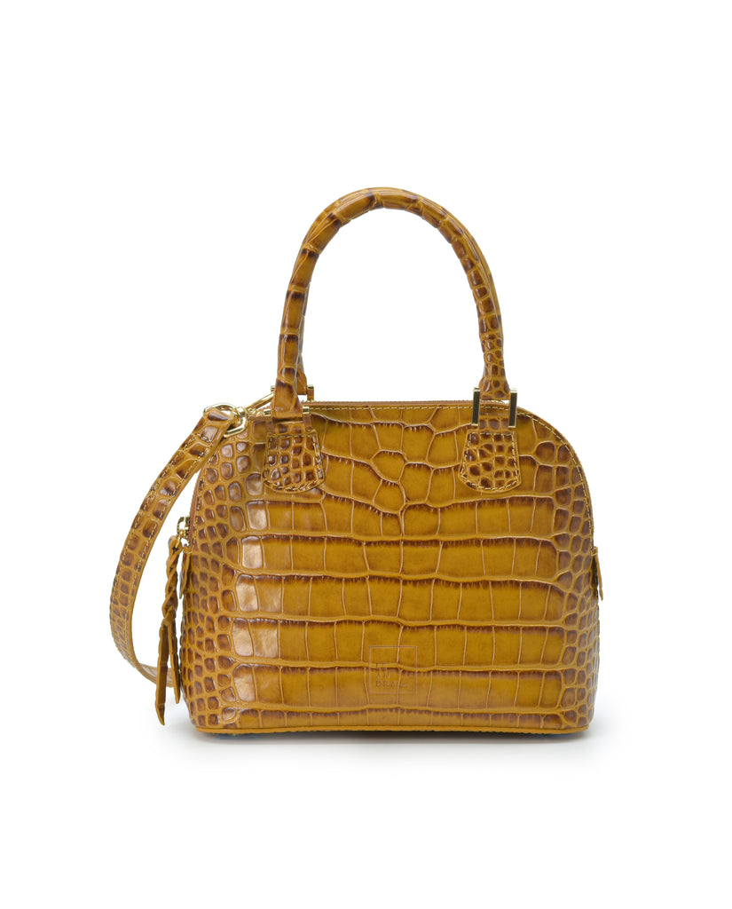 Imagen frontal con doble asa de bolso de mano mini de piel grabada en coco color camel Leandra. Made in Spain