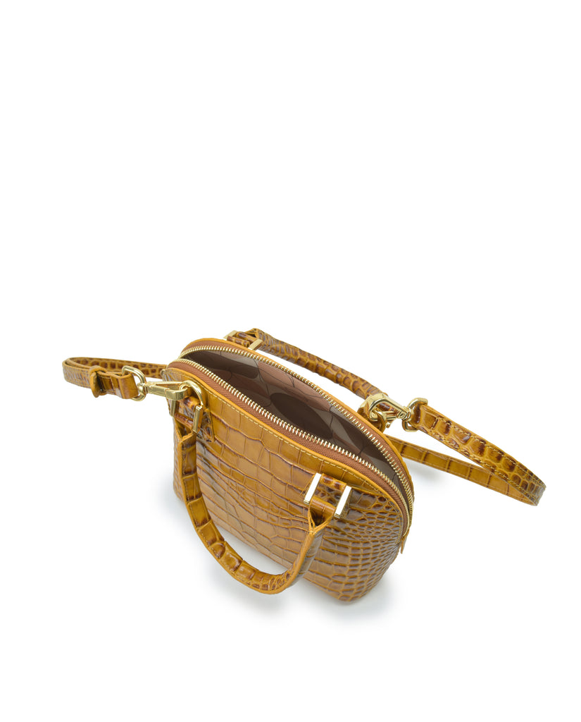 Interior asa corta de bolso de mano mini de piel grabada en coco color camel Leandra. Made in Spain