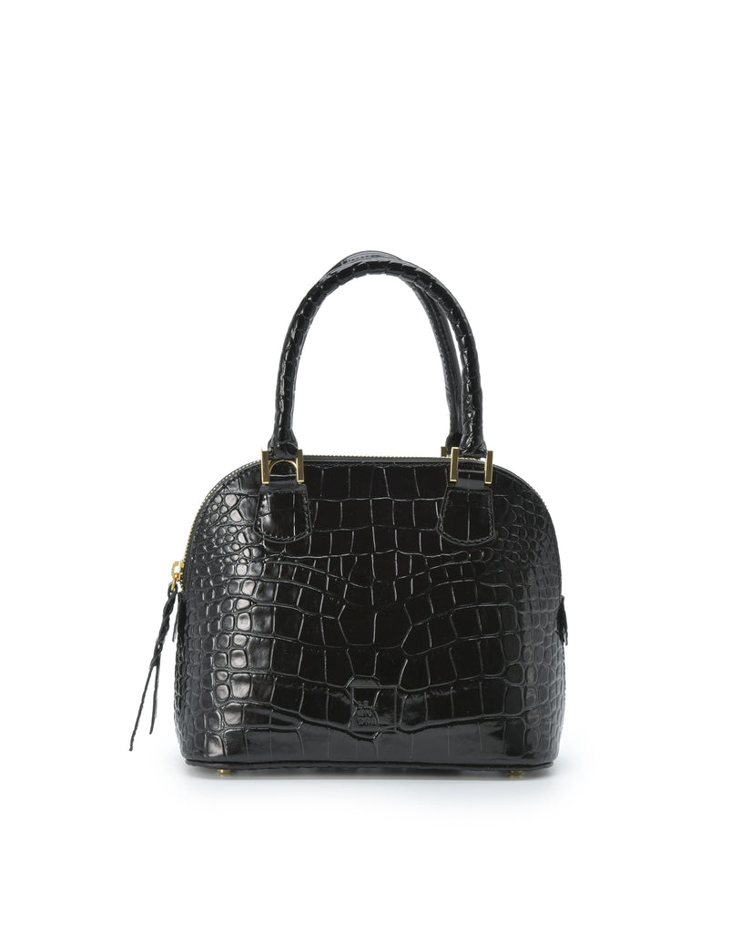 Imagen frontal con asa de mano del bolso de mano mini de piel grabada en coco color negro Leandra. Bolsos de piel fabricados en Ubrique Made in Spain