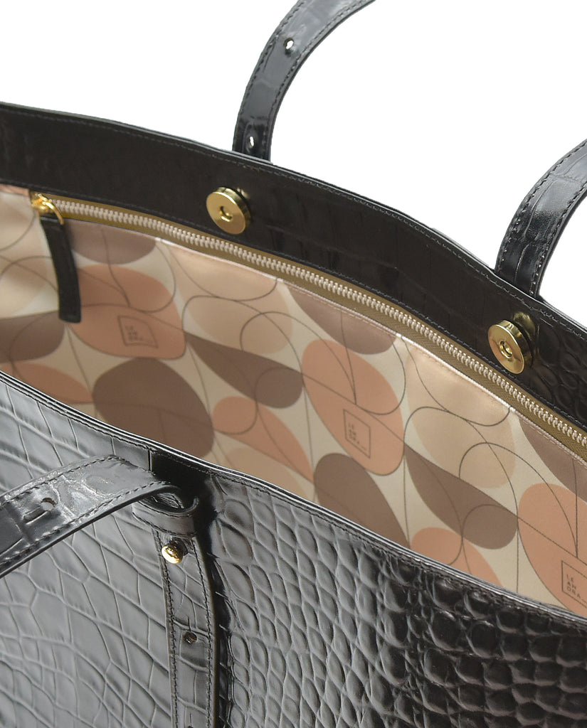 Interior y cremallera de  bolso shopping bag de piel grabado en coco negro Leandra