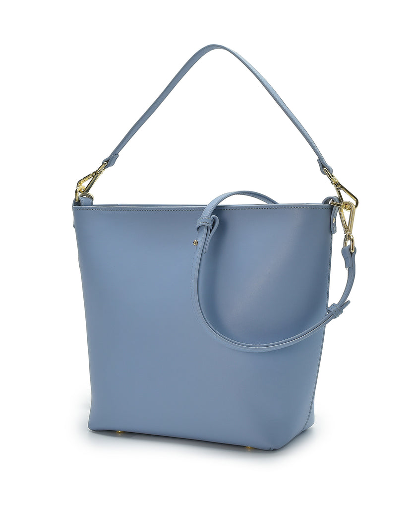 Imagen bolso doble asa. Bolso de hombro tipo tote bag de piel azul multiposición Leandra a la venta en leandrabrand.com 