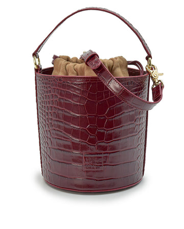 Imagen principal de bolso bucket de piel grabada en coco burdeos fabricado en España Leandra