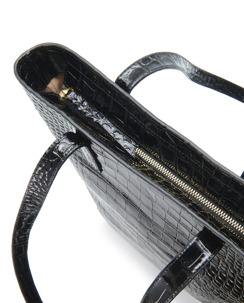 Imagen detalle cremallera de bolso shopper multiposición de piel grabada en coco color negro con cremallera Leandra. Bolso made in Spain