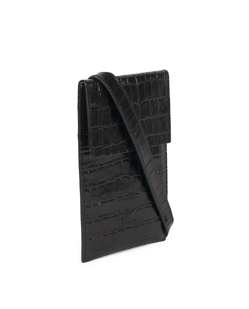 Detalle lateral de bolso mini bandolera negro de piel vacuno grabado coco Leandra. Mini bolsos made in Spain a la venta en leandrabrand.com