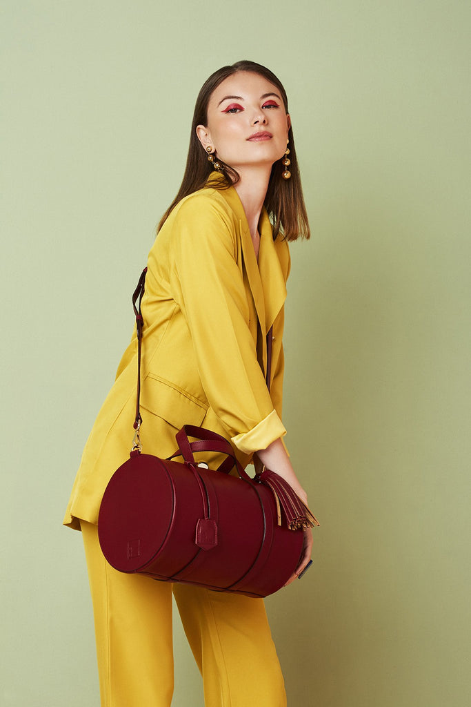 Bolso tipo bowling de piel burdeos Leandra. Bolsos de piel made in Spain Leandra