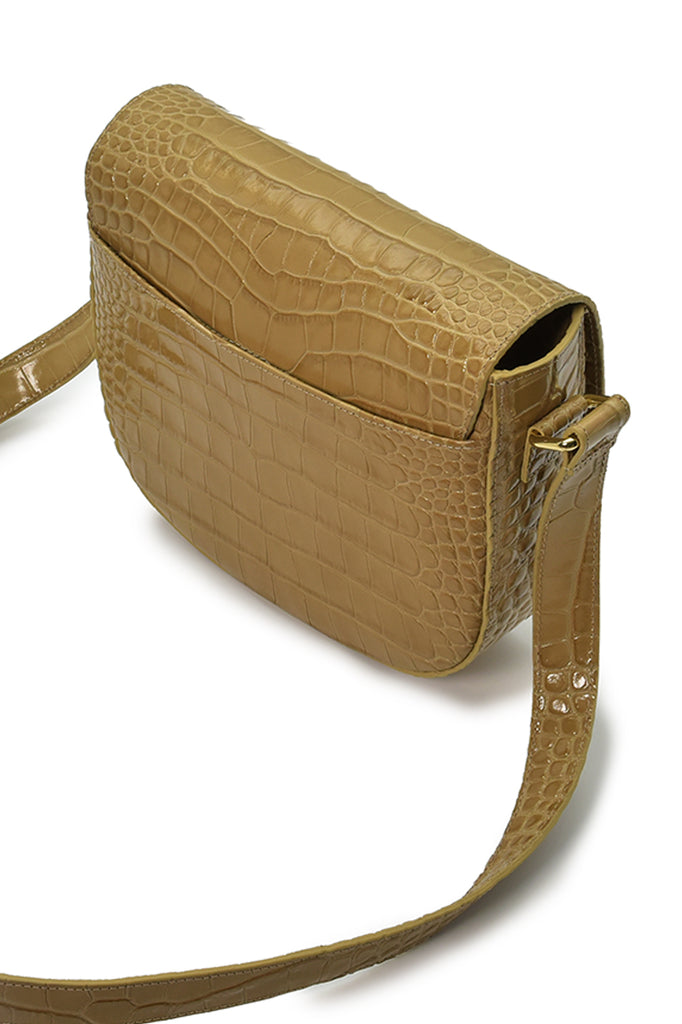 Imagen trasera de bolso de piel grabada en coco tipo bandolera beige made in Spain Leandra