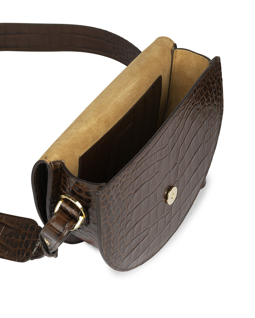 Imagen interior de Bolso saddle bag de piel grabada en coco marrón oscuro Leandra. Bolso de piel made in Spain Leandra