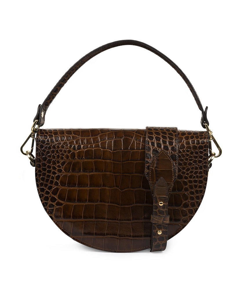 Imagen trasera de bolso tipo Saddle bag piel grabada coco marrón oscuro Leandra. Bolso de mano con asa bandolera de piel made in Spain Leandra.