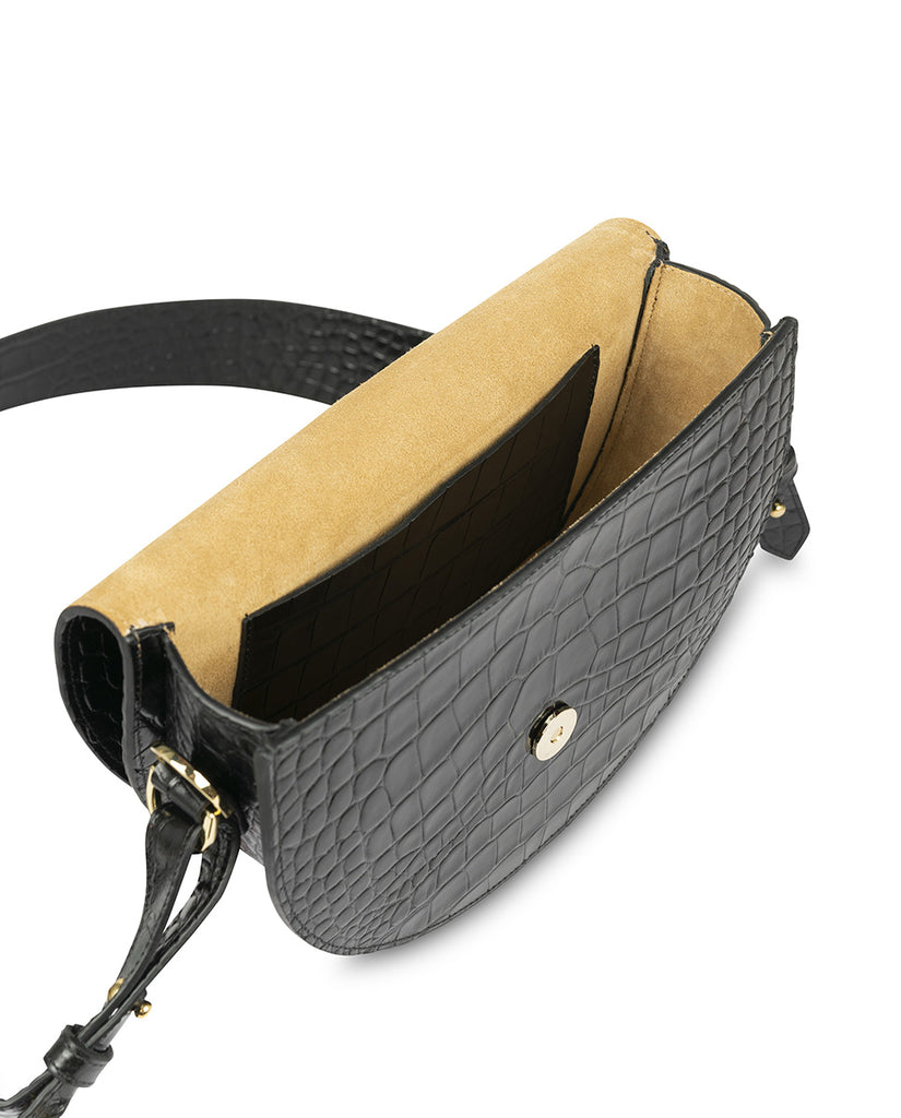 Imagen de interior de bolso saddle bag de piel grabada en coco negro Leandra. Bolso piel made in Spain Leandra
