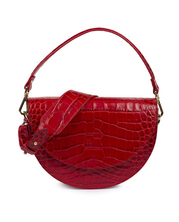 Imagen frontal de Bolso de piel grabada en coco color rojo tipo saddle bag Leandra. Bolso made in Spain Leandra