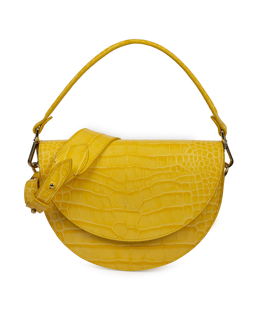 Imagen de bolso tipo Saddle bag de piel grabada en coco color amarillo Leandra. Bolso piel fabricado en España Leandra