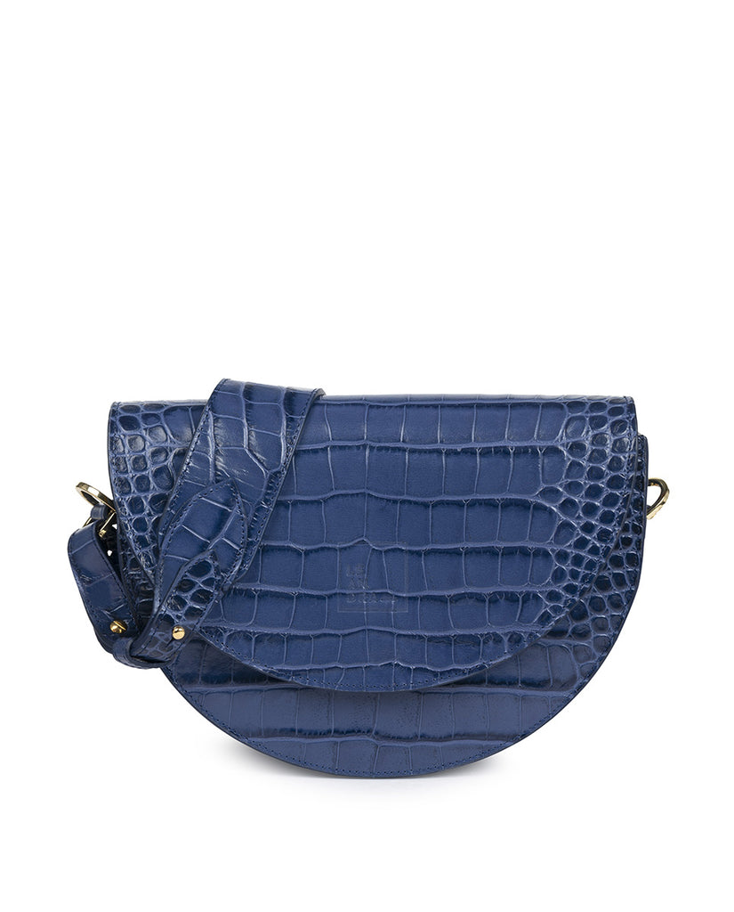 Imagen frontal sin asas de bolso tipo Saddle bag de piel grabada en coco azul klein Leandra. Bolso de piel made in Spain Leandra.