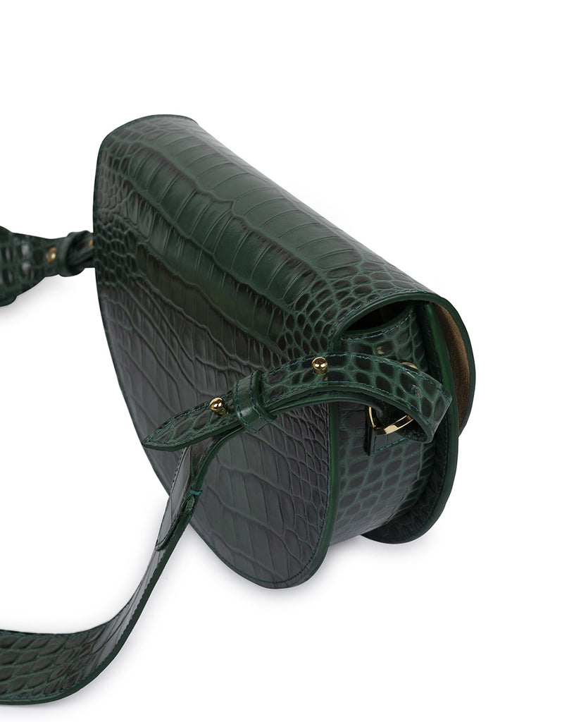 Imagen lateral de bolso tipo Saddle bag de piel grabada en coco verde Leandra. Bolso de piel made in Spain Leandra.