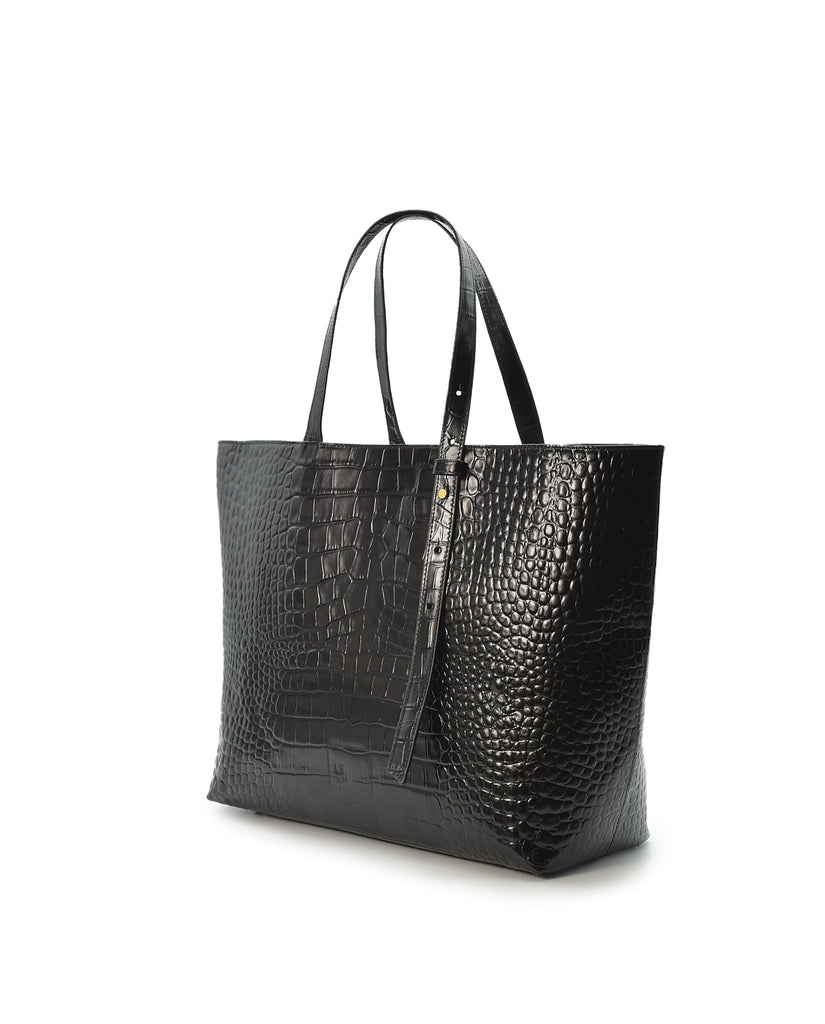 Imagen lateral de bolso shopping de piel grabada en coco negro Leandra made in Spain