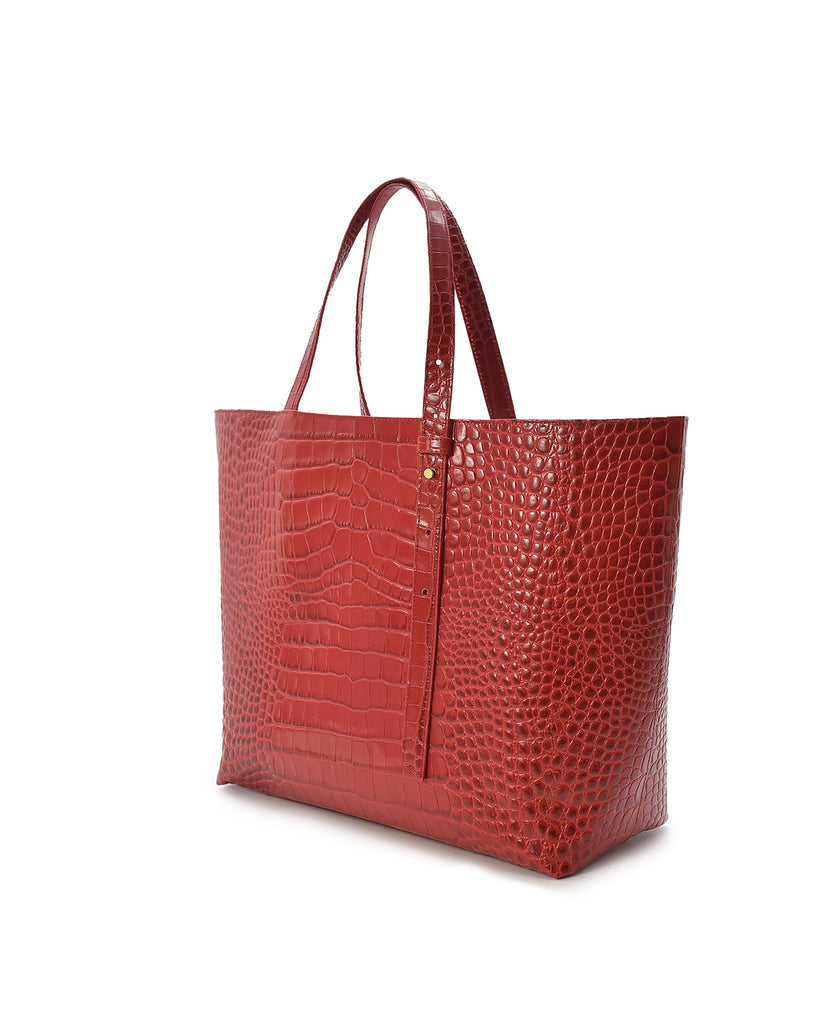 Imagen lateral de bolso Shopping bag de piel grabada en coco rojo Leandra made in Ubrique