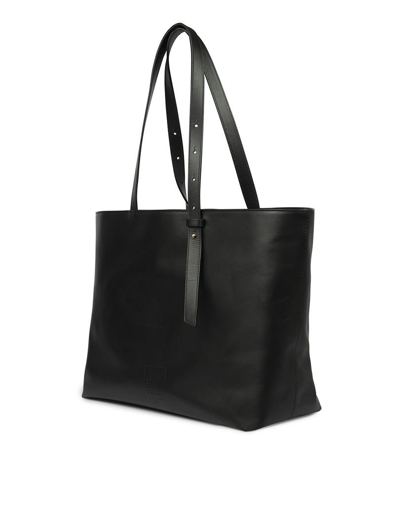Imagen lateral de Bolso shopping bag de piel de color negro Leandra. Bolsos piel made in Spain Leandra