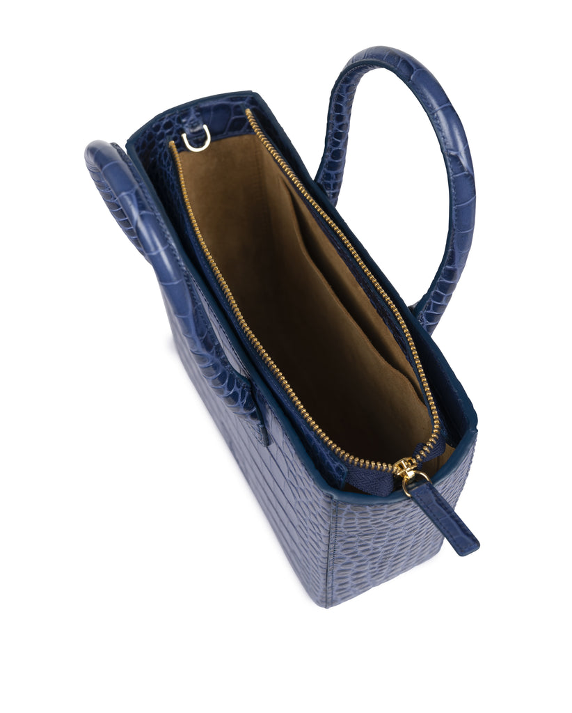 Imagen de interior de Bolso de piel grabada en coco color azul Leandra. Trapecio de color azul Leandra