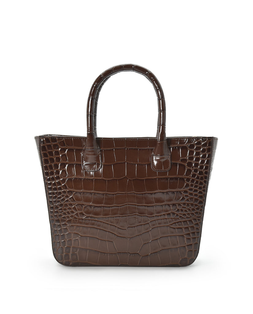 Imagen de bolso de piel grabada en coco tipo trapecio color marrón oscuro con asa fija y asa larga ajustable y extraíble made in Spain Leandra.