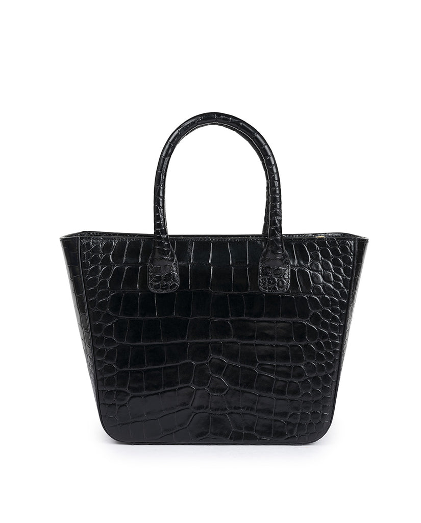Imagen de bolso con asas de mano tipo trapecio de piel grabada en coco negro Leandra. Bolsos made in Spain Leandra