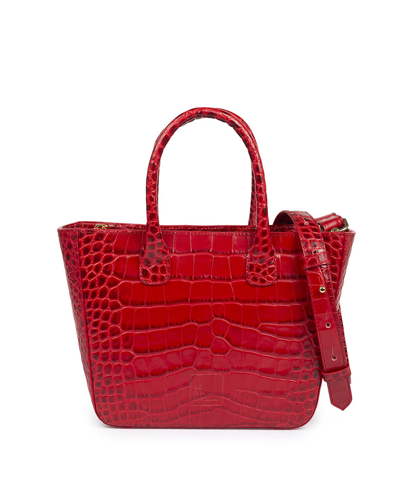 Imagen frontal de bolso tipo trapecio de piel grabada en coco rojo Leandra. Bolso made in Spain Leandra de piel fabricado en Ubrique, España.