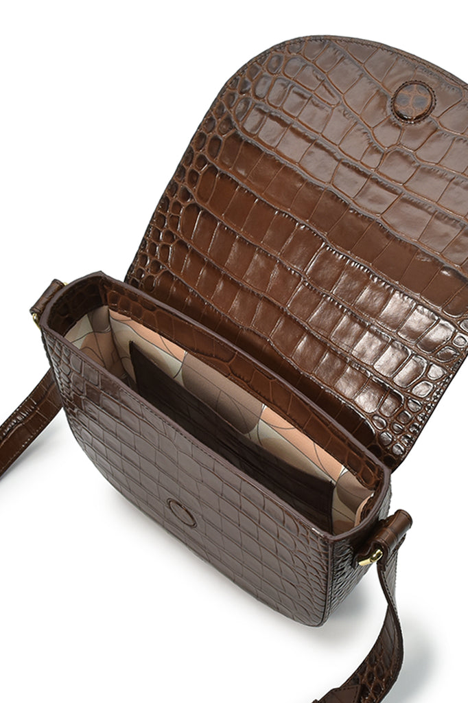 Bolso tipo bandolera de piel grabada en coco marrón Leandra fabricada en España