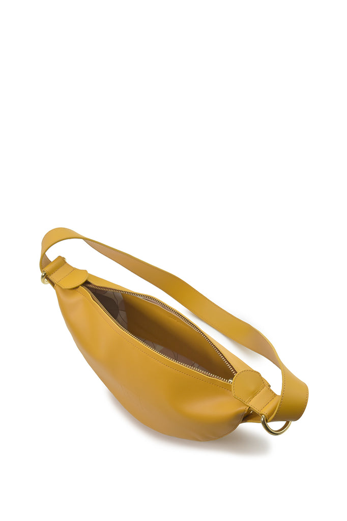 Bandolera media luna multiposición color amarillo mostaza Leandra interior