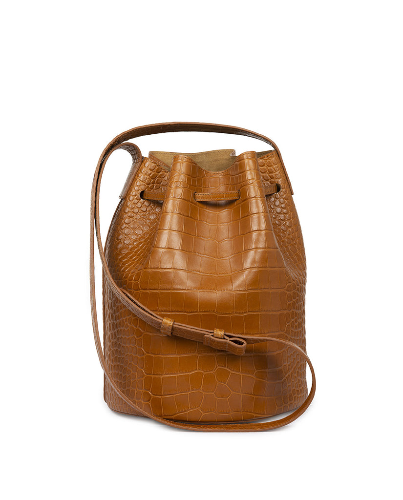 Bucket bag grabado en coco color caramel Leandra. Bolsos de piel made in Spain Leandra. Imagen trasera asas