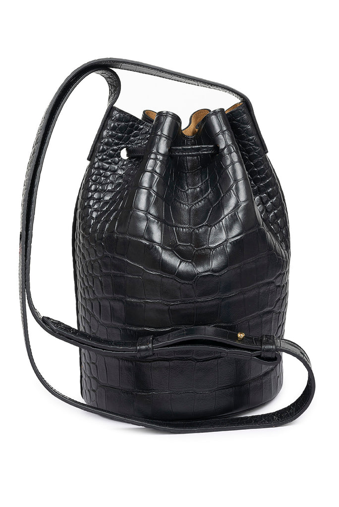 Bolso bucket bag mini de piel vacuna grabada en coco negro Leandra. Bolso made in Spain Leandra. Imagen asas