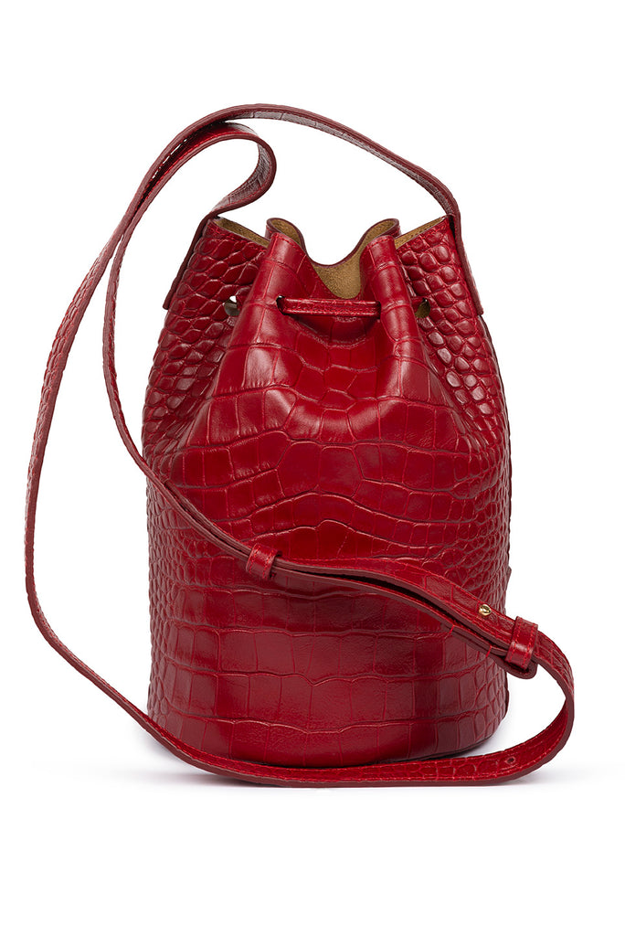 Bolso mini bucket grabado en coco rojo Leandra. Bolso made in Spain Leandra imagen trasera y detalle asa.